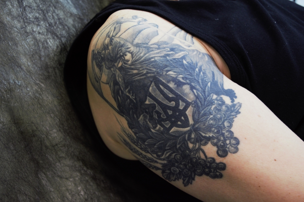 Sergey covered up his old Soviet tattoo with a triedent and Cossack warrior. Joti Heir/Kyiv